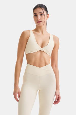 DAYFLEX TWIST FRONT SPORTS BRA - BUTTERMILK