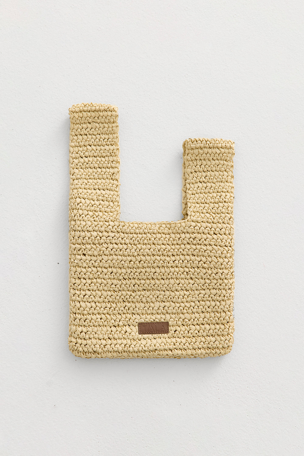 EMBOSSED LOGO RAFFIA CLUTCH BAG - NATURAL