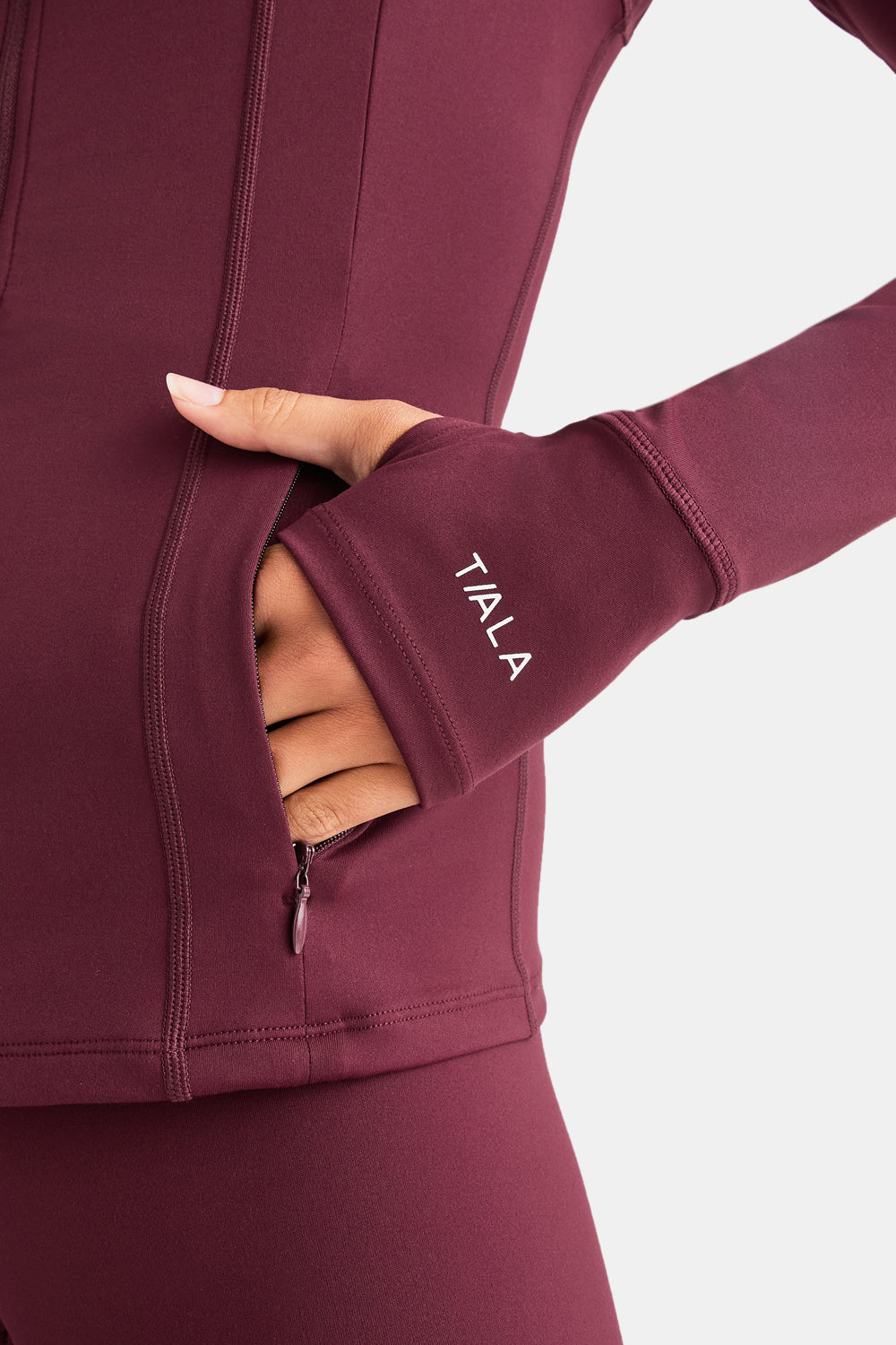 SKINLUXE ZIP THROUGH FULL LENGTH RUNNING TOP - BURGUNDY