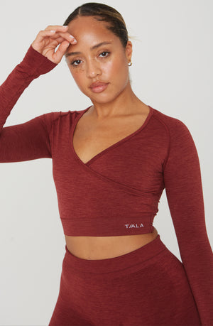 SCULPT SEAMLESS WRAP LONG SLEEVE CROP TOP - OXBLOOD RED MARL