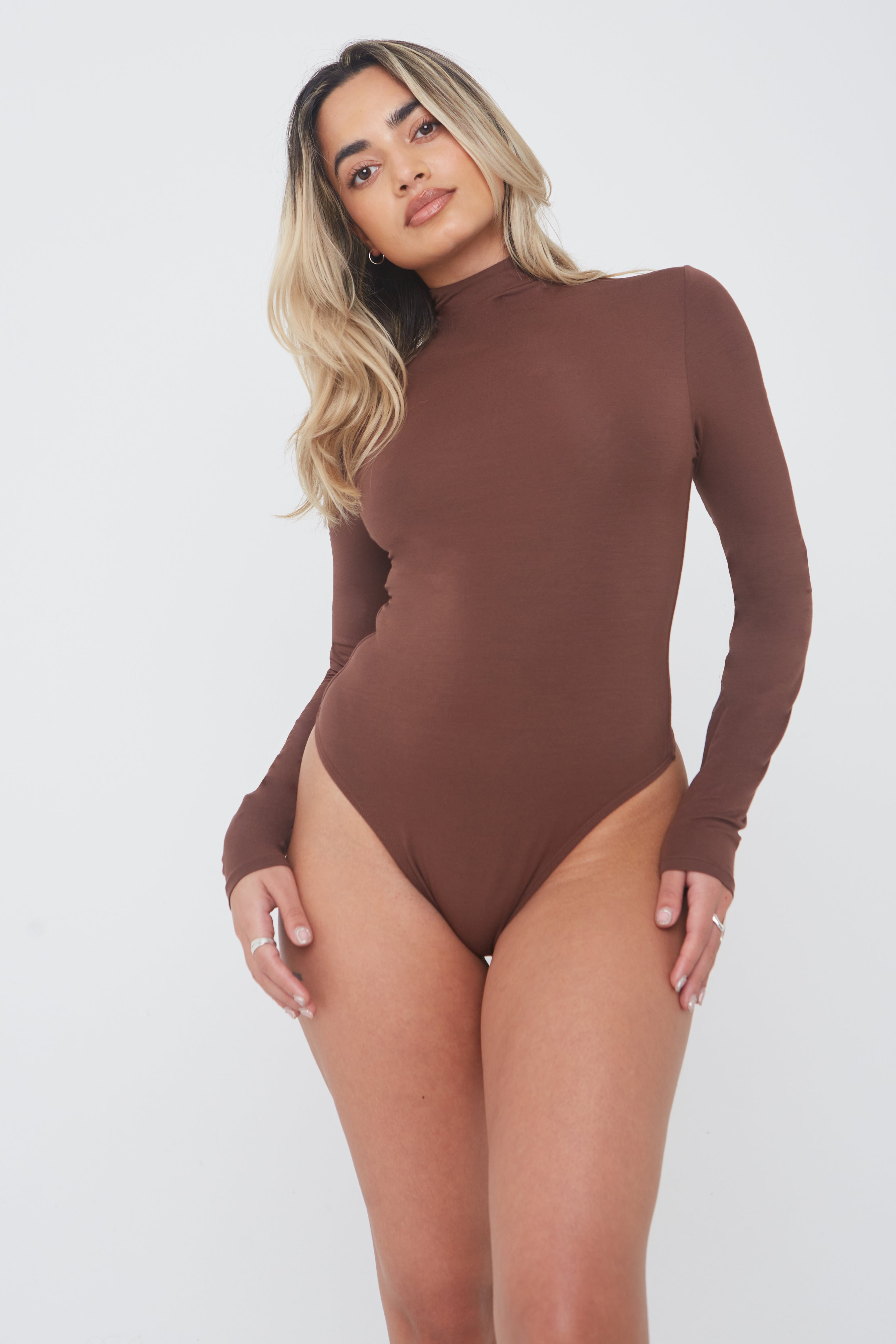 skims seamless sculpt collection is so buttery & flattering — wearing the sculpting  thong bodysuit in cocoa and feeling so confident…