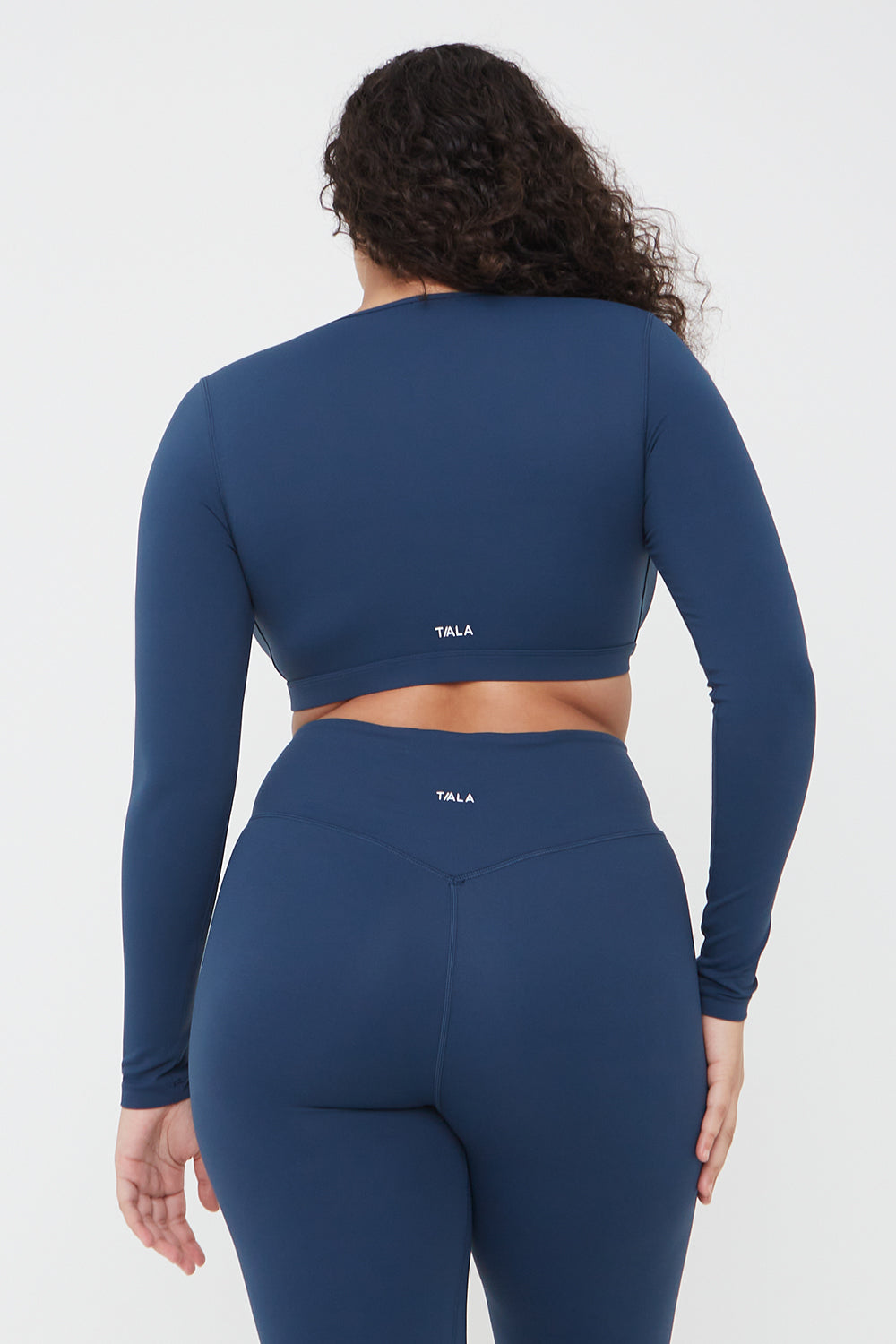 DAYFLEX WRAP LONG SLEEVE CROP TOP - SEA BLUE